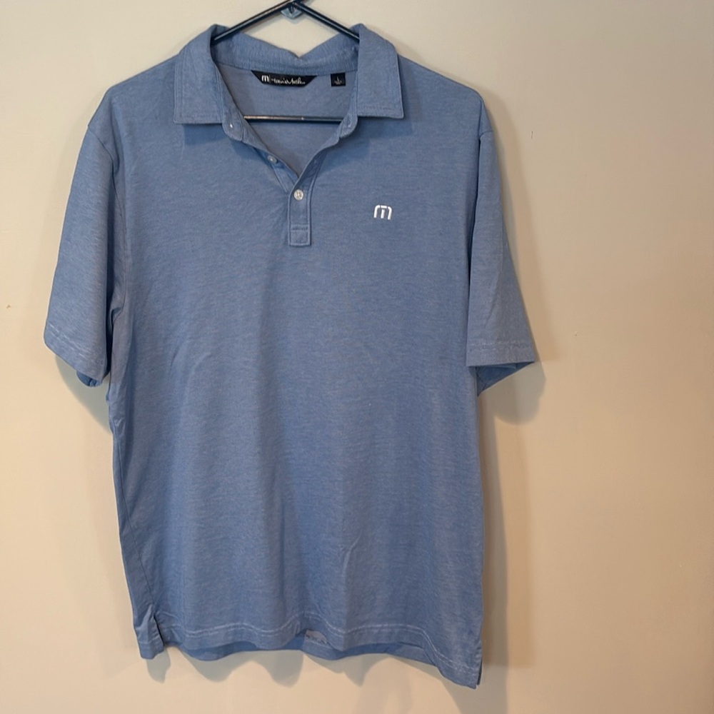 Men’s Large Travis Mathew blue Polo Shirtt